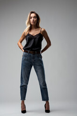 Casual grace meets chic in her posture