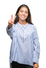 Young beautiful arab woman over isolated background smiling with happy face winking at the camera doing victory sign. Number two.