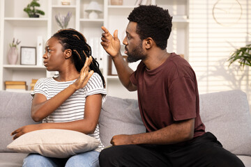 Conflict Resolution Between Couple At Home, Feeling, Misunderstanding,. Afro Man And Woman Sitting...