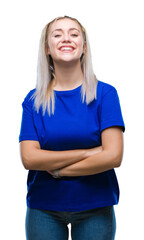 Fototapeta premium Young blonde woman over isolated background happy face smiling with crossed arms looking at the camera. Positive person.