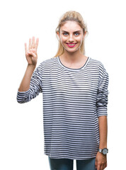 Obraz premium Young beautiful blonde woman wearing stripes sweater over isolated background showing and pointing up with fingers number four while smiling confident and happy.