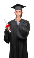 Young handsome graduated man holding degree over isolated background cover mouth with hand shocked with shame for mistake, expression of fear, scared in silence, secret concept