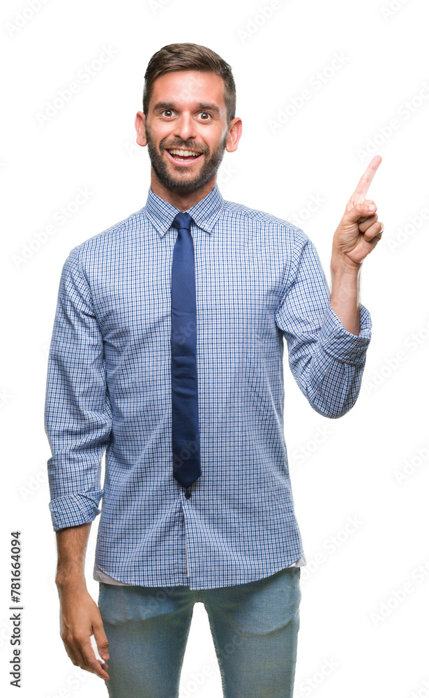 Canvas Prints young handsome business man over isolated background with a big smile on face, pointing with hand an