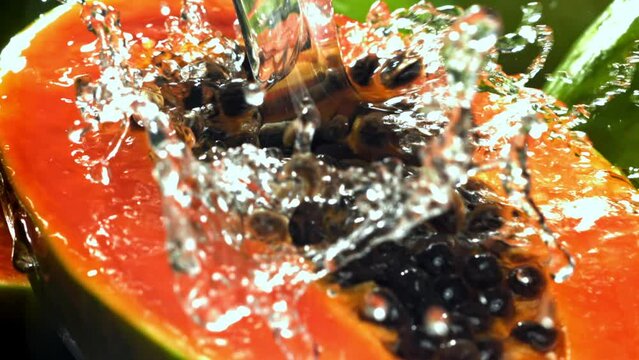 Super slow motion fresh papaya. High quality FullHD footage