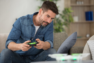 mature man plays video games