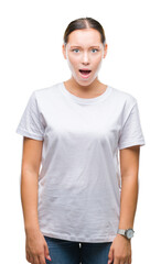 Young beautiful caucasian woman over isolated background afraid and shocked with surprise expression, fear and excited face.