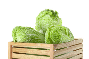 Fresh ripe Chinese cabbages in wooden crate isolated on white