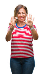 Middle age senior hispanic woman over isolated background showing and pointing up with fingers number eight while smiling confident and happy.