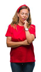 Middle age senior hispanic woman over isolated background thinking looking tired and bored with depression problems with crossed arms.