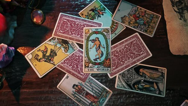Bali, Indonesia - January 15, 2014. Art of The World Card signifying the realisation of dreams in the future. Art on tarot card predicting completion of dreams. Cards art forecasting realised dreams.