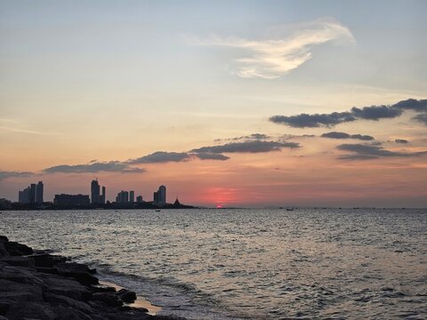 sunset on the beach at pataya thailand, twilight sky at sea side, 