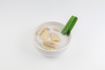 Banana in coconut milk (Kluay Buat Chi) on white background. Popular Traditional dessert of asian, Thailand.