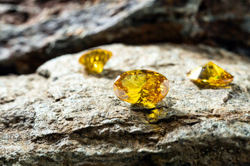 Natural yellow Sapphire gemstone, Jewel or gems on stone, close up shot
