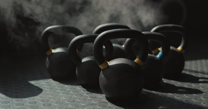 Kettlebell, gear and equipment for workout, fitness and exercise for health and wellness. Gym, studio or crossfit club for physical training, weight loss and competition body building with cardio