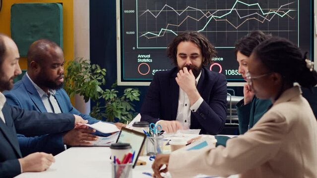 Forecast affiliates gathering infographics data in developing meeting, address brand differentiation strategies to highlight company unique value in the market. Public relations management. Camera A.