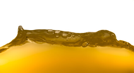 Oil surface splashed ,golden liquid ripple isolated on white background.