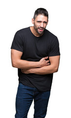 Obraz premium Young handsome man over isolated background with hand on stomach because nausea, painful disease feeling unwell. Ache concept.