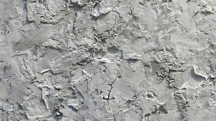 Close-up of weathered white wall showing multiple cracks