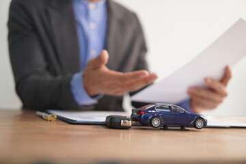 Agent Assurance Securing Deals with Confidence close up man working with car contract document or...