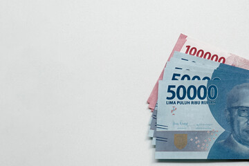 Rupiah notes on a white background