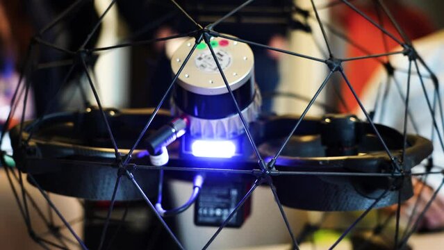 Industrial drone in cage protection with modular payload lidar sensor