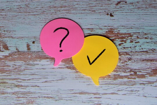 Speech bubble with question mark and a tick icon. Asking question and getting answer concept.