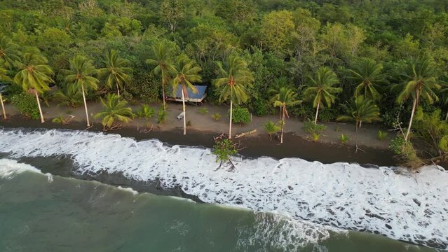 Flying along the remote beach Playa Mecana near Bah&iacute;a Solano in the Choc&oacute; department on the Pacific Coast of Colombia