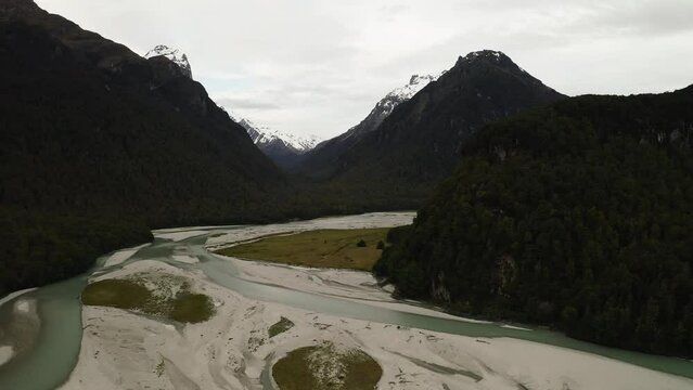 Flying up the Dart River as it divides into two channels through the sandy basin. Paradise, New Zealand.