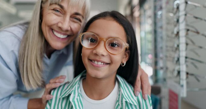 Shopping, glasses or face of child with doctor for eye care, retail and vision for help or choice. Woman, kid or portrait of girl with optician or lens for new frames or optometry for prescription