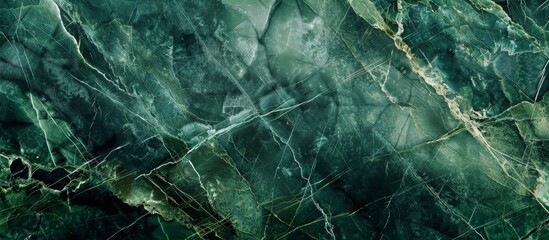 Green marble surface in close view contrasting against a dark black background