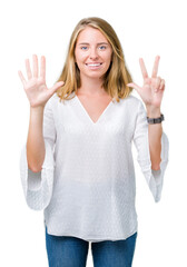 Fototapeta na wymiar Beautiful young elegant woman over isolated background showing and pointing up with fingers number eight while smiling confident and happy.