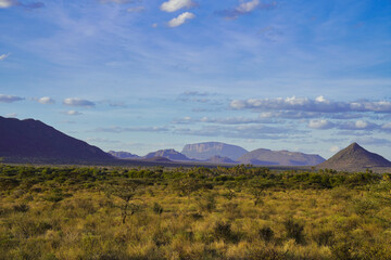 Mount Ololokwe,sacred to the local Samburu tribe and the pyramid shaped Lolpopong highlight the...