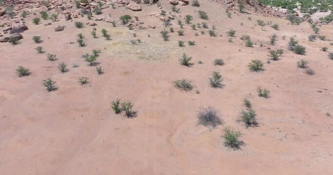 Drone flight over the Namibian desert landscape near Twyfelfontein during the day