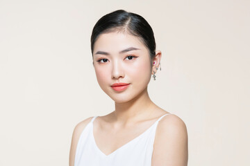 Beauty woman healthy clean skin beautiful female young model isolated on beige