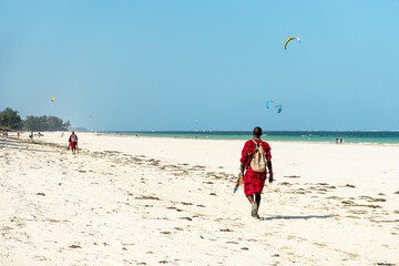 Maasai warrior, souvenir seller, on beach. Diani Beach, Kenya Mombasa