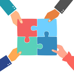 Business team members unite puzzle pieces together to one as team building symbol. Employee teamwork concept.