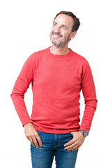 Fototapeta premium Handsome middle age hoary senior man wearing winter sweater over isolated background smiling looking side and staring away thinking.