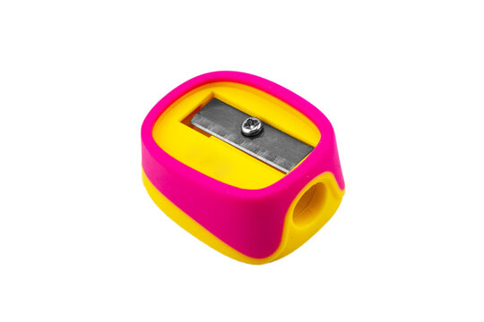 Pencil sharpener isolated on a white background. Manual purple pencil sharpener