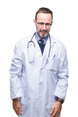Middle age senior hoary doctor man wearing medical uniform isolated background depressed and worry...