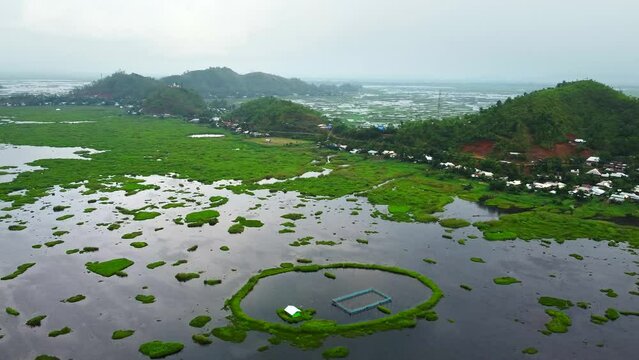 Aerial view loktak lake is the largest freshwater lake and thanga village in India as well as the largest lake in manipur north east India.