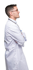 Handsome young doctor man looking to side, relax profile pose with natural face with confident...