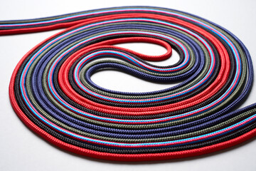 Colorful rope twisted on a white background - 781812610