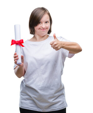 Young adult woman with down syndrome holding degree over isolated background happy with big smile doing ok sign, thumb up with fingers, excellent sign