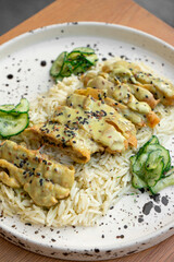 Basmati rice with fried chicken and green sauce