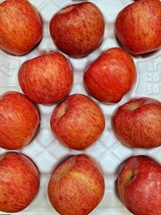 Premium Korean red apples Busa on the white background