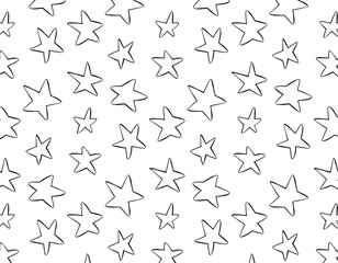 Seamless abstract pattern with black hand drawn shabby stars on white background.  Cosmos texture for paper, wrapping and fabric.