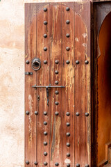 Wooden door in the old city of Meknes