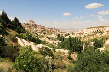 Fototapeta na wymiar View onto Uchisar with the famous Pigeon Valley, Güvercinlik Vadisi right next to it, Cappadocia, Turkey