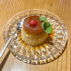 Custard Pudding on the glass dish with caramel syrup