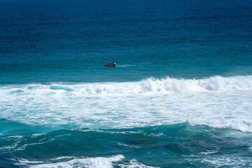 boat in the sea with waves